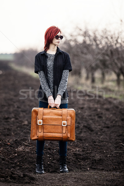 Young woman with travel bag Stock photo © Massonforstock