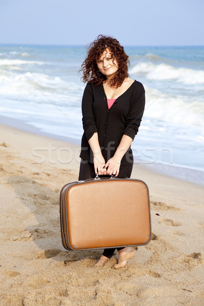 Redhead girl at outdoor with suitcase Stock photo © Massonforstock