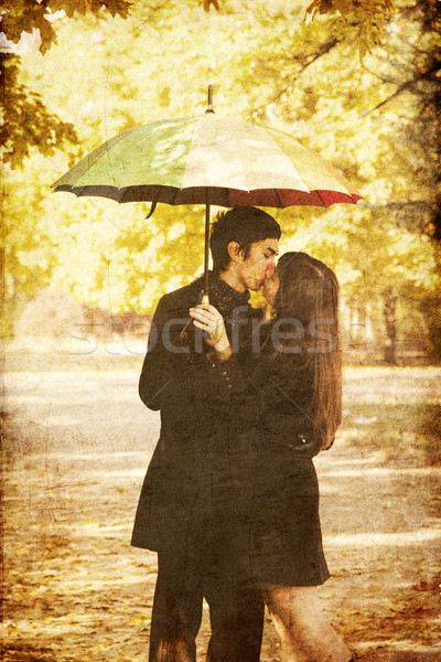 Couple kissing at alley in the park. Stock photo © Massonforstock
