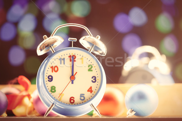 Clock and Christmas lights Stock photo © Massonforstock