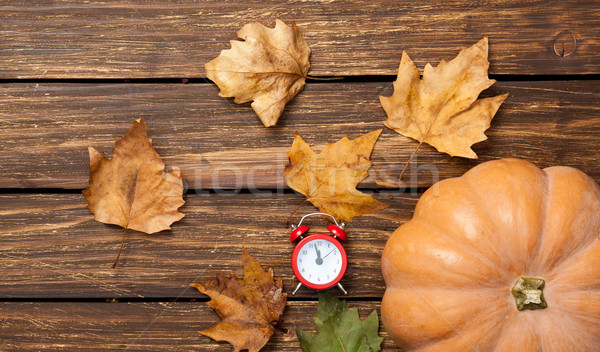 Pumpkin and alarm-clock Stock photo © Massonforstock