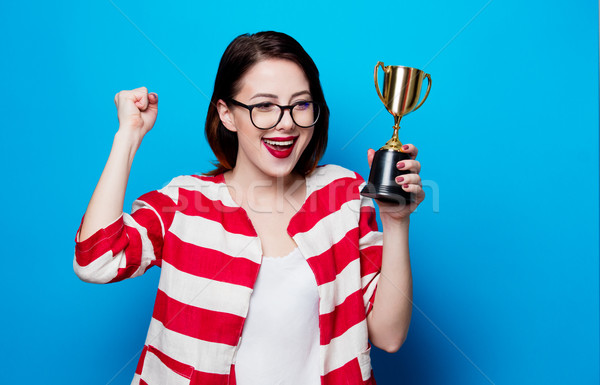 Stockfoto: Jonge · glimlachende · vrouw · beker · trofee · portret · mooie