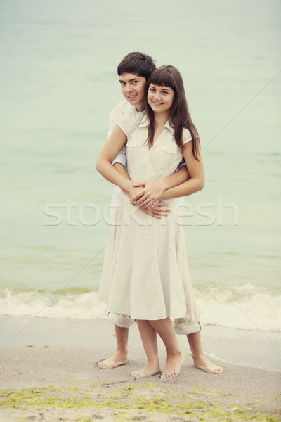 Stock photo: Closeup portrait of happy couple enjoying vacations on the beach