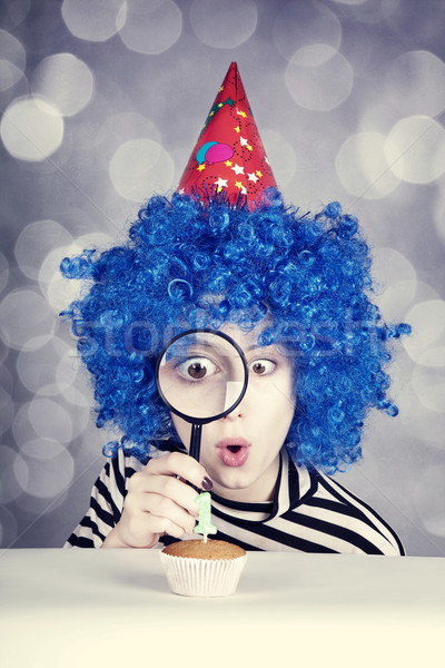 Funny girl with blue hair and striped jacket Stock photo © Massonforstock