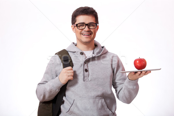 Young man with red apple Stock photo © Massonforstock