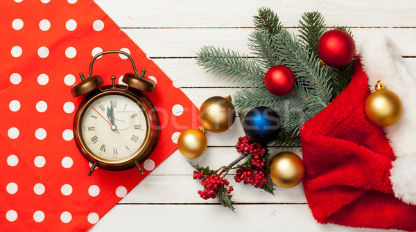 Stock photo: Alarm clock and christmas baubles 