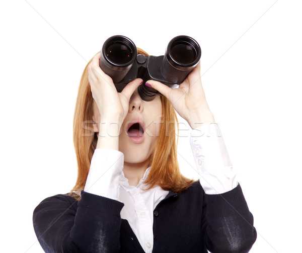 Business women seeking with binocular Stock photo © Massonforstock