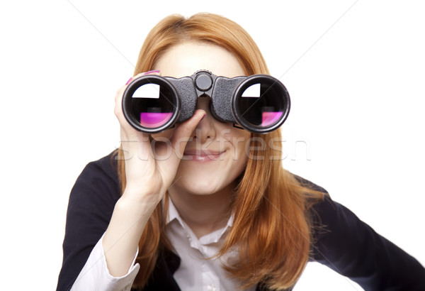 Business women seeking with binocular Stock photo © Massonforstock