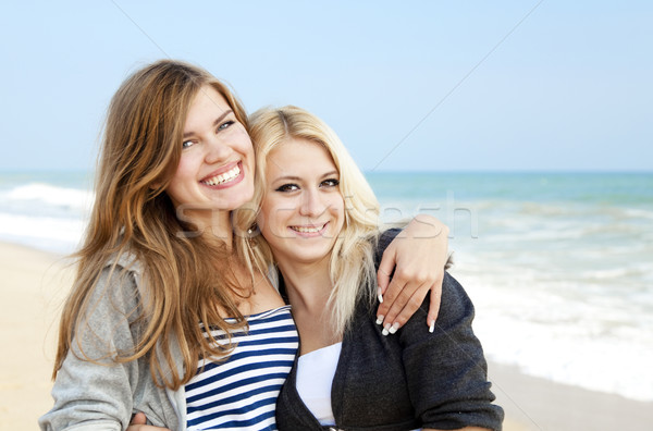 Two girls at outdoor near sea Stock photo © Massonforstock
