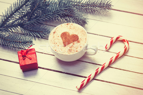Cup of coffee and christmas gifts Stock photo © Massonforstock