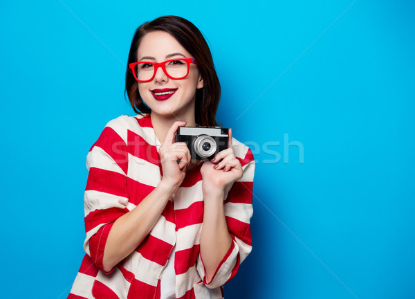 young smiling woman with retro camera Stock photo © Massonforstock