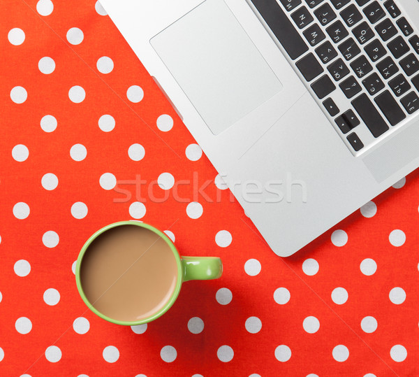 Cup of coffee and laptop computer  Stock photo © Massonforstock