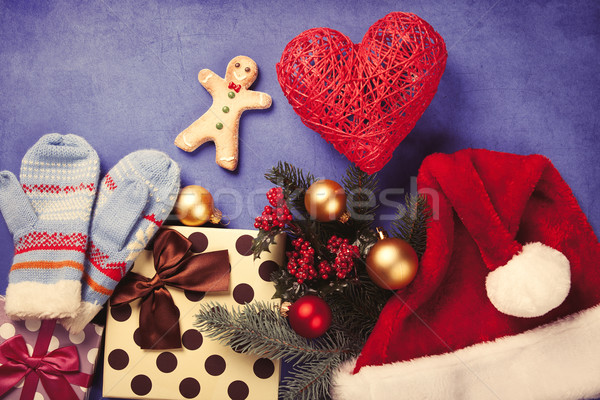 Gingerbread man and Christmas gifts Stock photo © Massonforstock