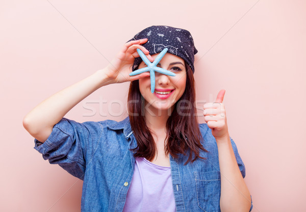 portrait of a young woman with starfish Stock photo © Massonforstock