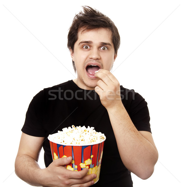 Funny men eating popcorn.  Stock photo © Massonforstock