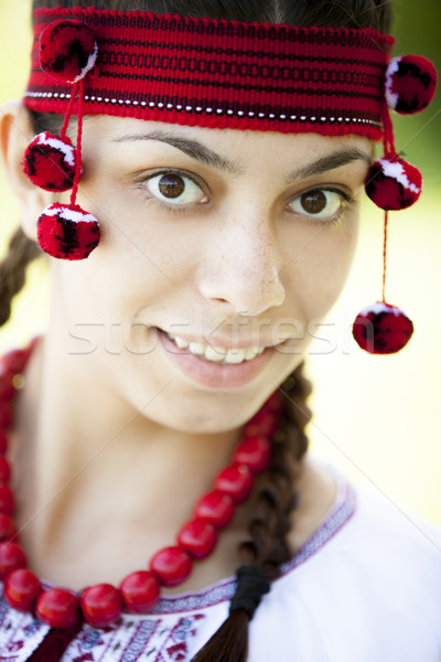 Stock photo: Slav girl at green meadow.