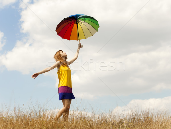 Zdjęcia stock: Dziewczyna · parasol · łące · chmury · dance · piękna