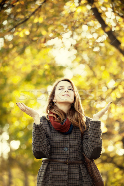 Stil kız güzel sonbahar geçit Stok fotoğraf © Massonforstock