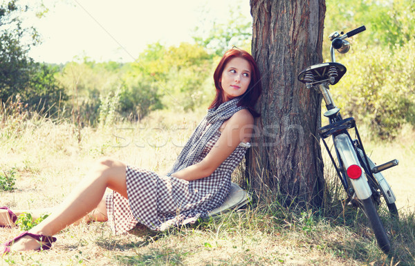 girl sitting on bike