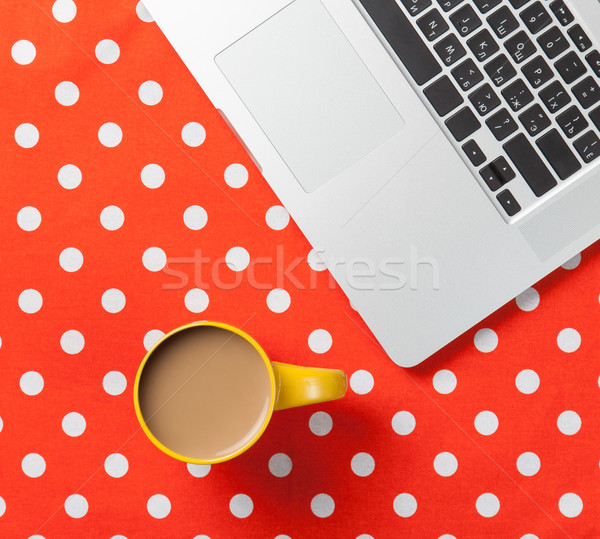 Cup of coffee and laptop computer  Stock photo © Massonforstock
