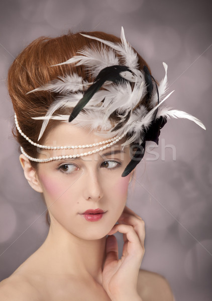Redhead girl with Rococo hair style at vintage background. Photo Stock photo © Massonforstock