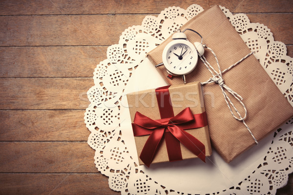 gifts and clock on napkin Stock photo © Massonforstock