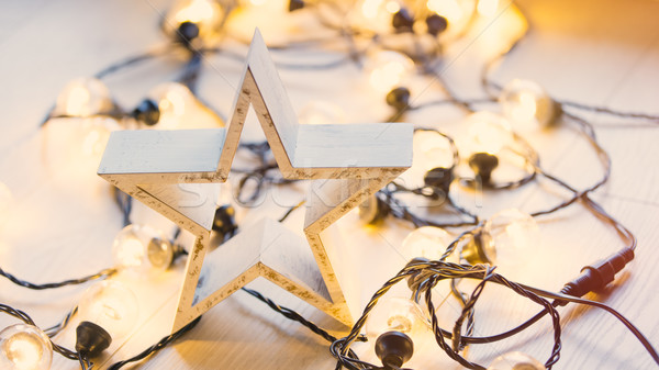 Christmas gift and fairy lights Stock photo © Massonforstock