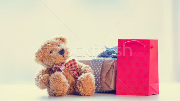 cute teddy bear, shopping bag and beautiful gift on the wonderfu Stock photo © Massonforstock