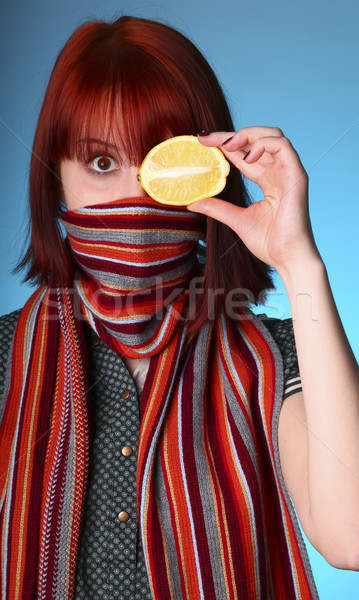 Chill girl in scarf keep lemon instead of eye  Stock photo © Massonforstock
