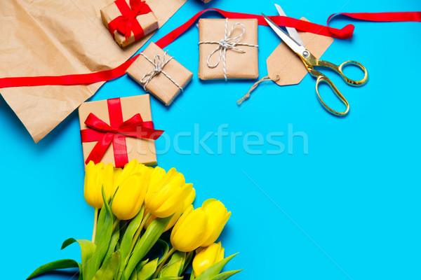 cute yellow tulips, beautiful gifts and cool things for wrapping Stock photo © Massonforstock