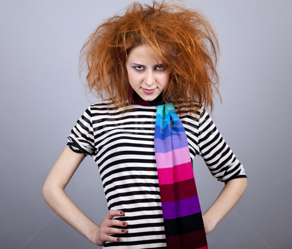 Angry girl with funny hair. Stock photo © Massonforstock