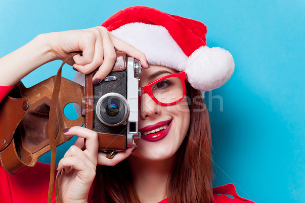 Stock photo: woman with photo camera