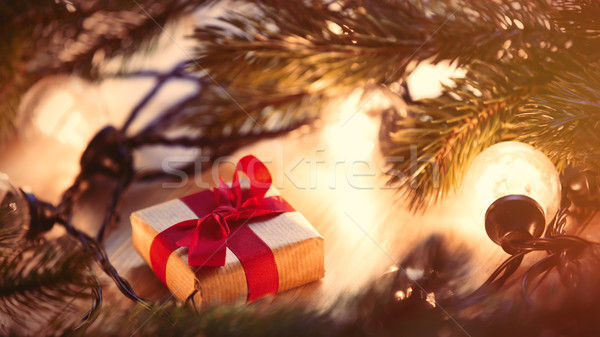 Christmas gift and fairy lights Stock photo © Massonforstock