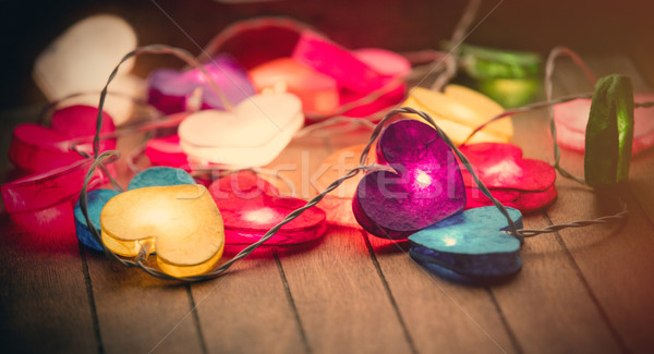 beautiful colorful heart shaped garland lying on the wonderful b Stock photo © Massonforstock