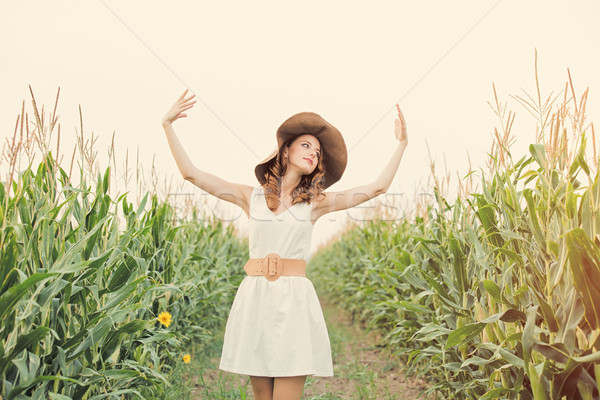 Fotó gyönyörű fiatal nő áll csodálatos mező Stock fotó © Massonforstock