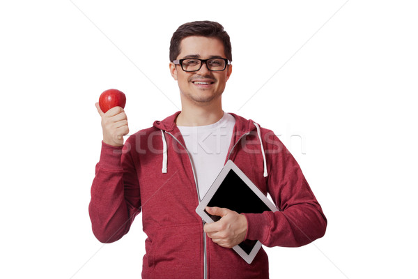 Young man with red apple Stock photo © Massonforstock
