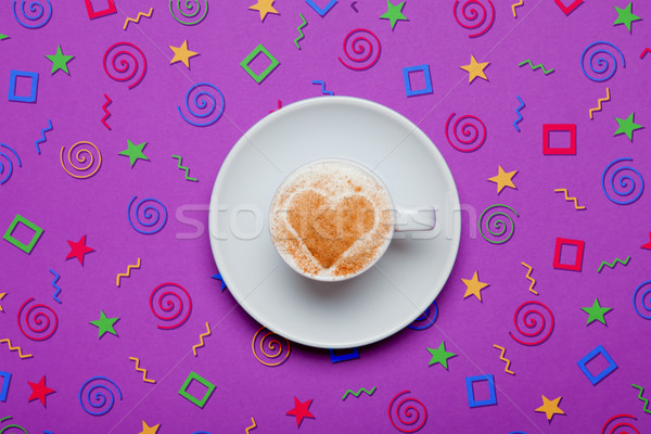 photo of cup of coffee on the wonderful purple background in pop Stock photo © Massonforstock