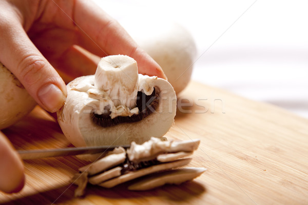 Mushrooms cutting Stock photo © Massonforstock
