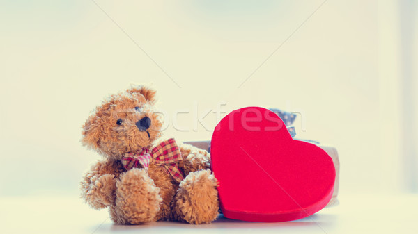 cute teddy bear, blue gift and beautiful heart shaped toy on the Stock photo © Massonforstock