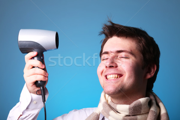 oy in scarf with hairdryer  Stock photo © Massonforstock