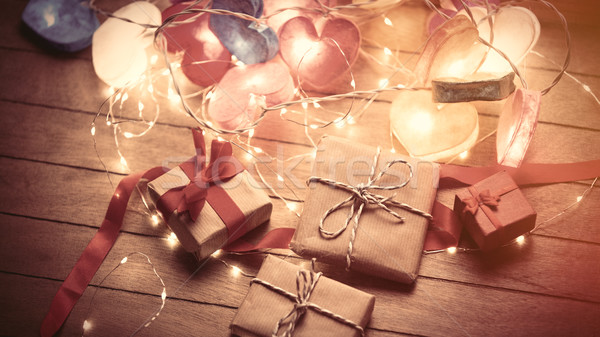 beautiful colorful heart shaped garland and cute gifts lying on  Stock photo © Massonforstock
