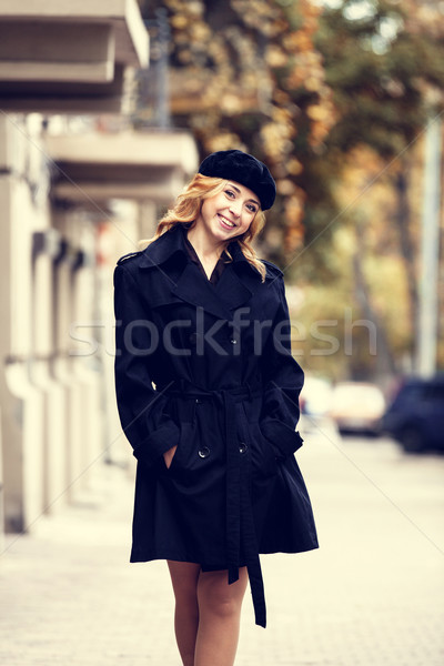 Single girl at the autumn street. Stock photo © Massonforstock