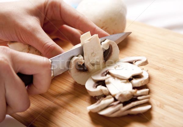 Mushrooms cutting Stock photo © Massonforstock