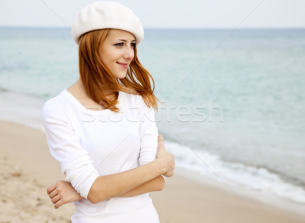 Stock photo: Young beautiful girl walking at the beach