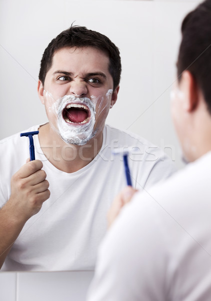 Surprised real men shaving. Stock photo © Massonforstock