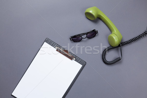  green handset with sunglasses  Stock photo © Massonforstock