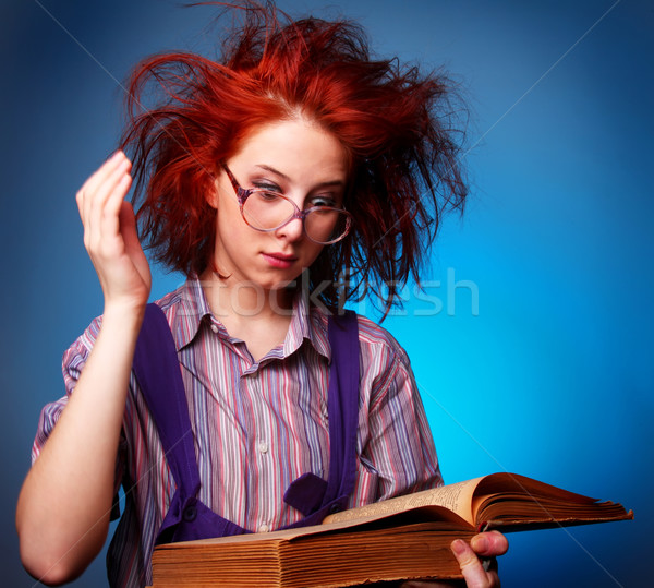 Young wizard girl with old magic book  Stock photo © Massonforstock