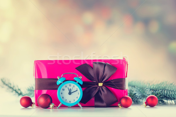 Christmas gift and baubles with clock Stock photo © Massonforstock