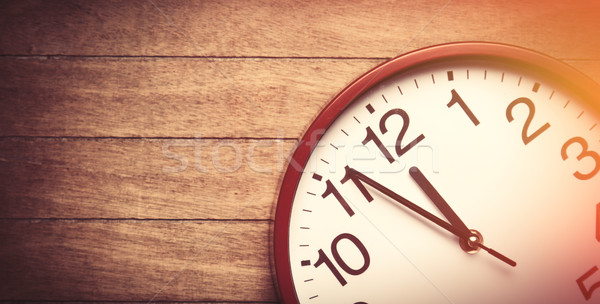 Huge clock on a table. Stock photo © Massonforstock