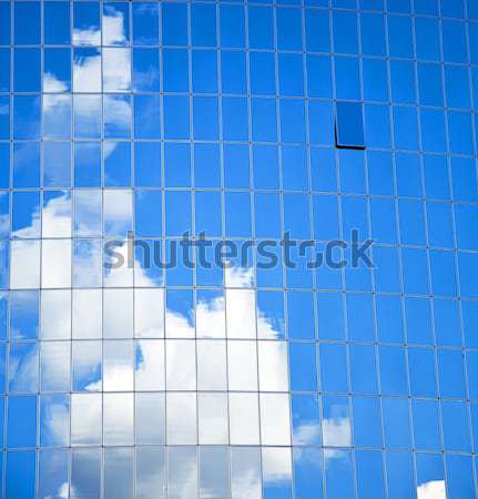 High-rise edifício de vidro céu nuvens reflexão edifício Foto stock © Massonforstock